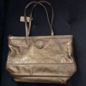 Gray Coach purse with zipper